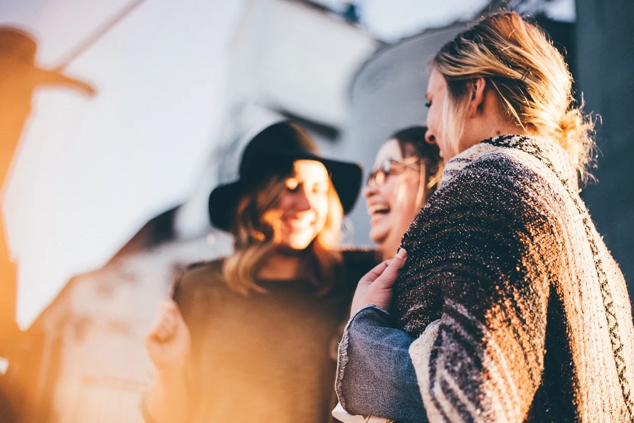 happy holidays, women, talking, laugh, happy, friends, casual, outdoors, people. Membership community publishing platform guide